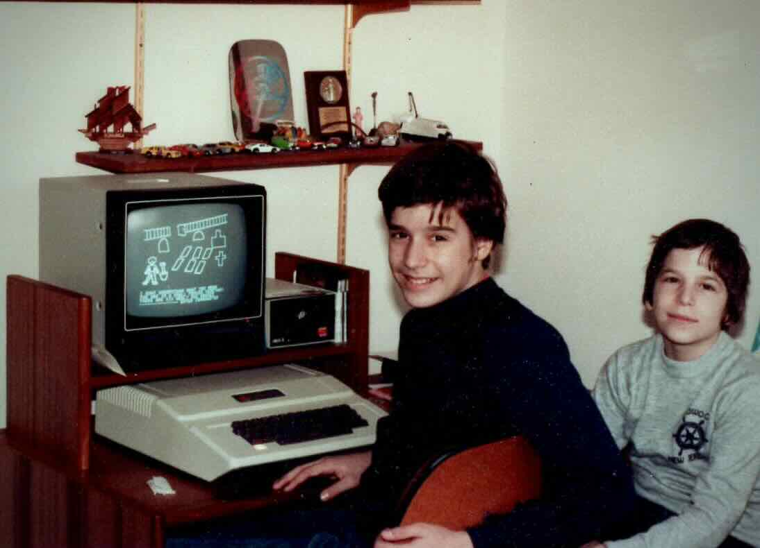My brother and I sitting in front of an Apple II Plus in my bedroom.